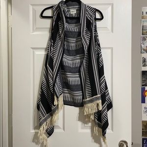 Black and white fringe vest